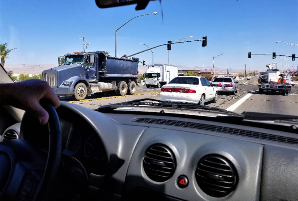 car before accident at intersection in need of Washington auto accident lawyer