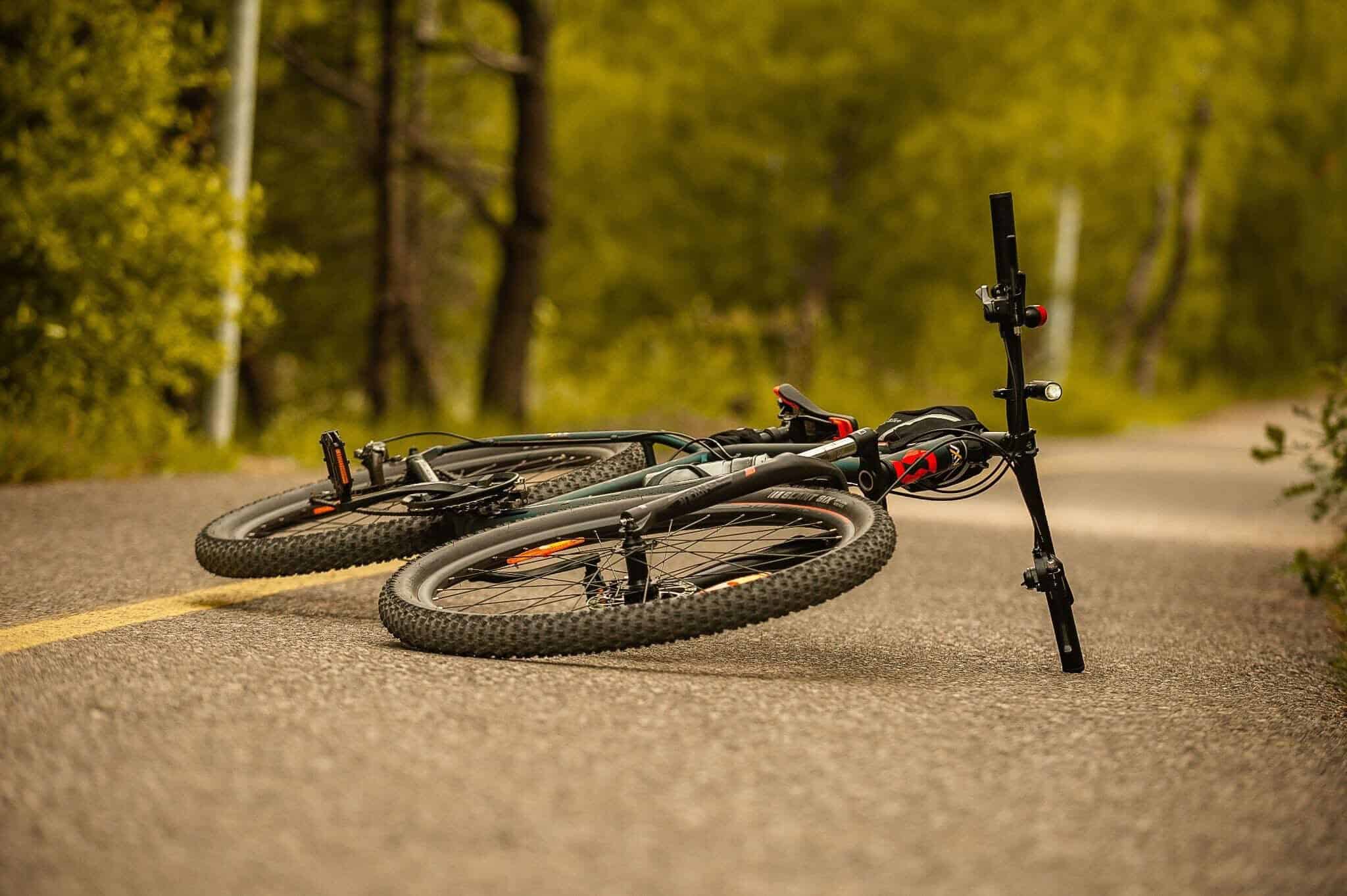 Bicycle lying on the road after a crash.