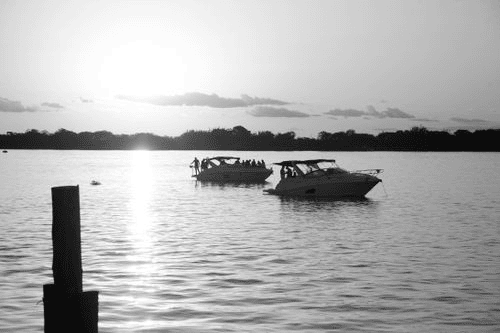 Two recreational boats on a body of water